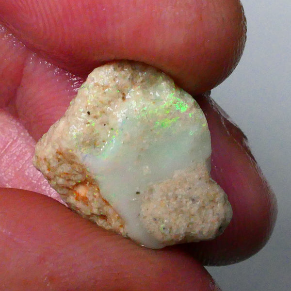 untouched Lightning Ridge seam opal formation rough 6.80cts Bright Vibrant zone of Green dominant fires poking through the skin 17x15x7mm Lot B4-A658