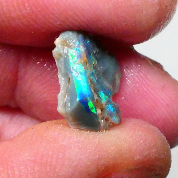 Electric green/blue/teal Bright Multifires 3.60cts Dark base seam opal rough of Lightning Ridge  Lot B4-A674
