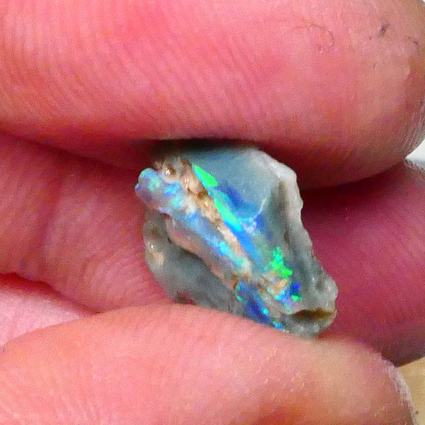 Electric green/blue/teal Bright Multifires 3.60cts Dark base seam opal rough of Lightning Ridge  Lot B4-A674