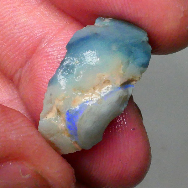 piece of dark base seam opal rough 13.20cts Blues/Greens to chase & exposed sold as gamble 25x11x10mm  Lot B4-A671