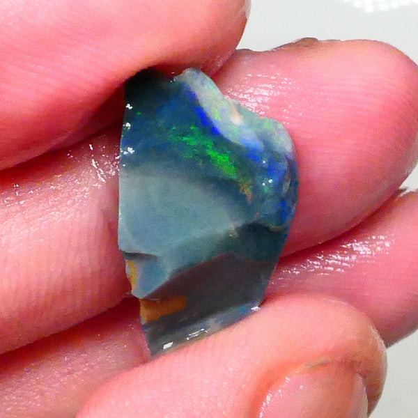 Orange/green/blue on black here :) 9.50cts Lightning ridge material to gamble cut 24x12x6mm  Lot B4-A680