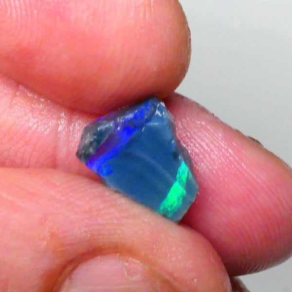 Blue green Vertical bars on showing on exposed face 2.30cts Lightning Ridge Dark base rough to cut & polish 12x9x3mm Lot B4-A717