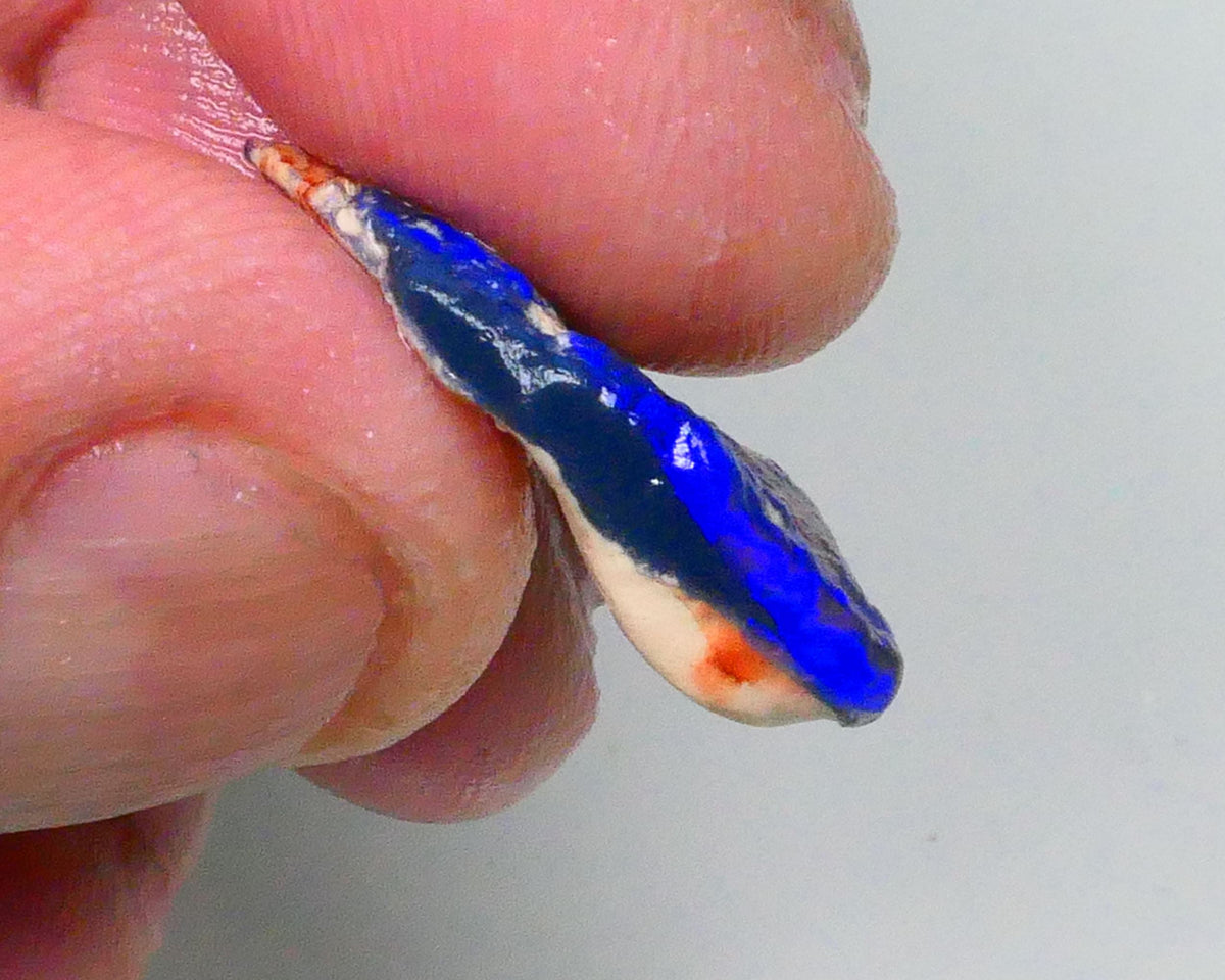 Bright Royal blue fires visible side to in nice flat bar 5.70cts Lightning Ridge Black Seam opal rough 24x11x5mm   Lot B4-A713