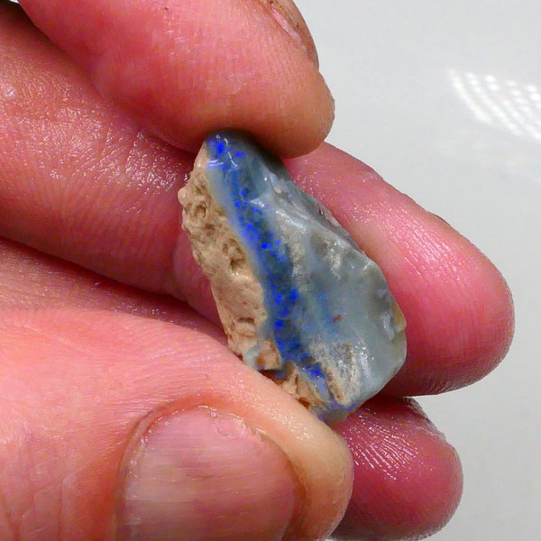 Lightning Ridge Dark base seam opal rough 14.20cts Side 2 Side & end 2 End visible blue bar to expose 23x13x9mm Lot B4-A721