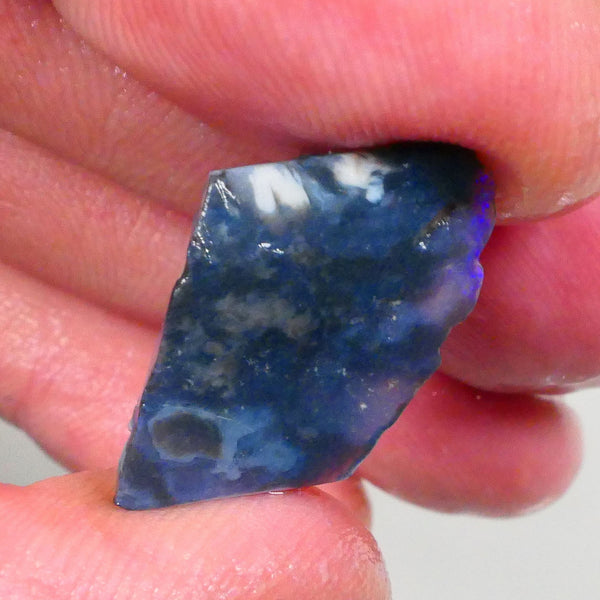 Lots of blues showing in this dark base seam opal rough 6.00cts Lighting Ridge material to cut 23x14x4mm Lot B4-A749