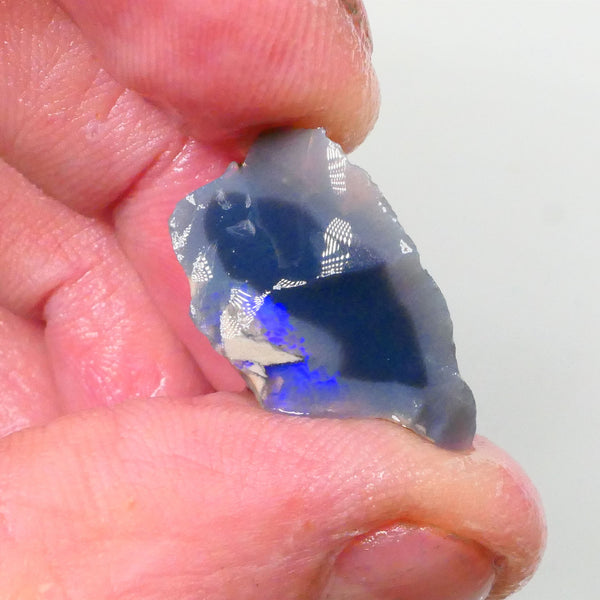 Piece of a Dark base knobby opal rough 12.35cts Lightning Ridge Zone of exposed Blue fires to gamble 23x14x10mm Lot B4-A745