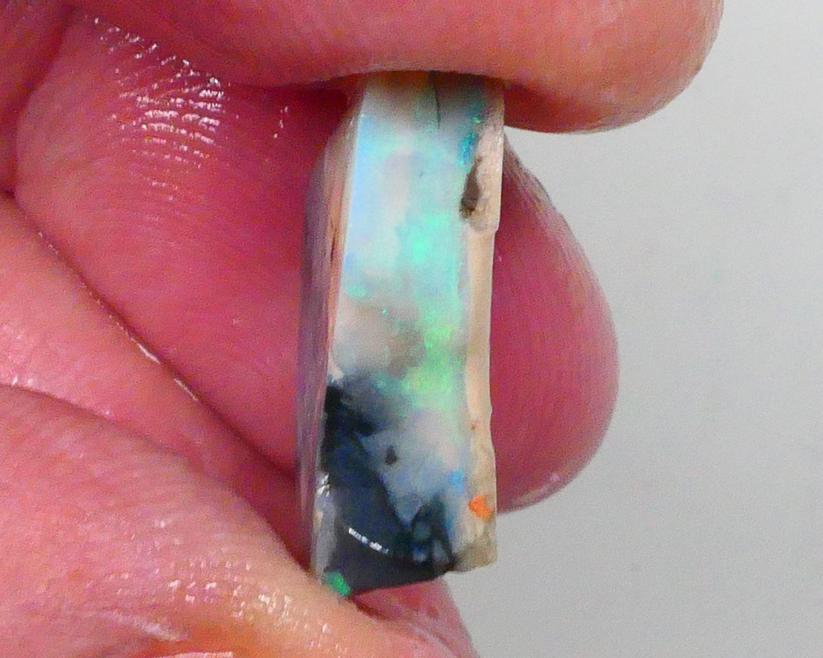 Green dominant fires on this Black/Dark Seam opal rough 10.15cts Lightning Ridge Material to cut 21x15x5mm Lot B4-A742