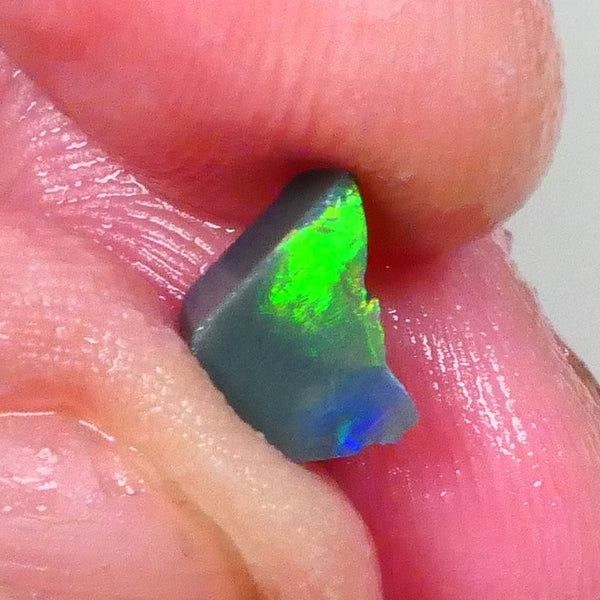 Gorgeous Broad zone of Electric Bright Green fires 1.60cts Lightning Ridge rub/rough pointer to finish 8x6x5mm   Lot B4-A736