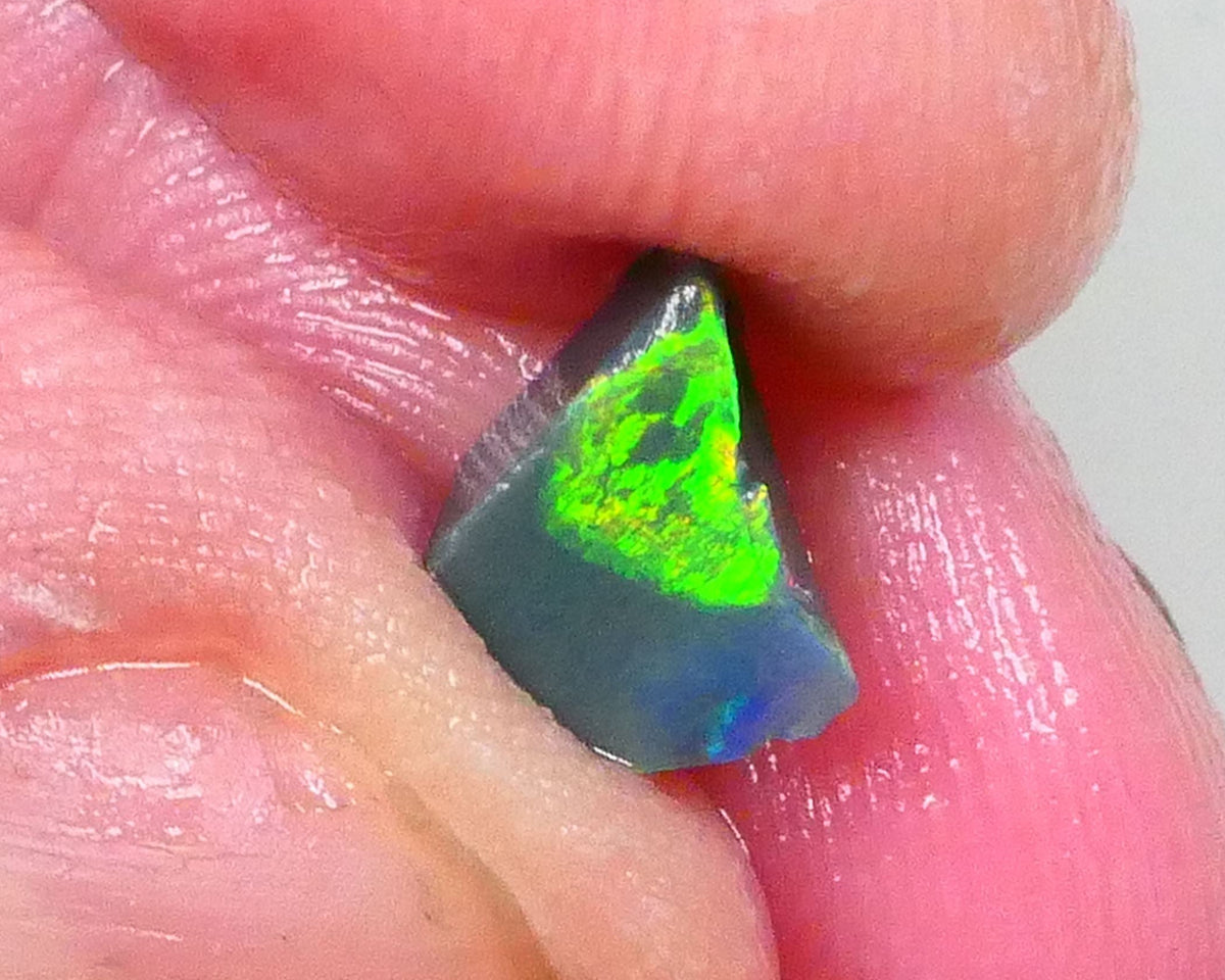 Gorgeous Broad zone of Electric Bright Green fires 1.60cts Lightning Ridge rub/rough pointer to finish 8x6x5mm   Lot B4-A736