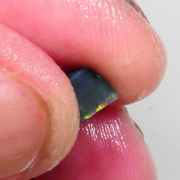 Gorgeous Broad zone of Electric Bright Green fires 1.60cts Lightning Ridge rub/rough pointer to finish 8x6x5mm   Lot B4-A736