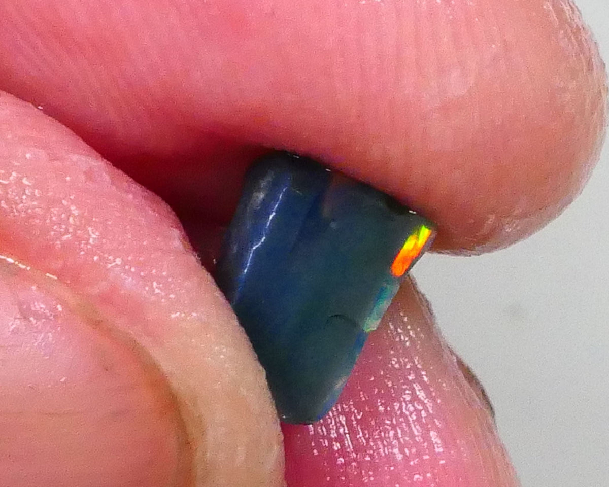 Gorgeous Broad zone of Electric Bright Green fires 1.60cts Lightning Ridge rub/rough pointer to finish 8x6x5mm   Lot B4-A736