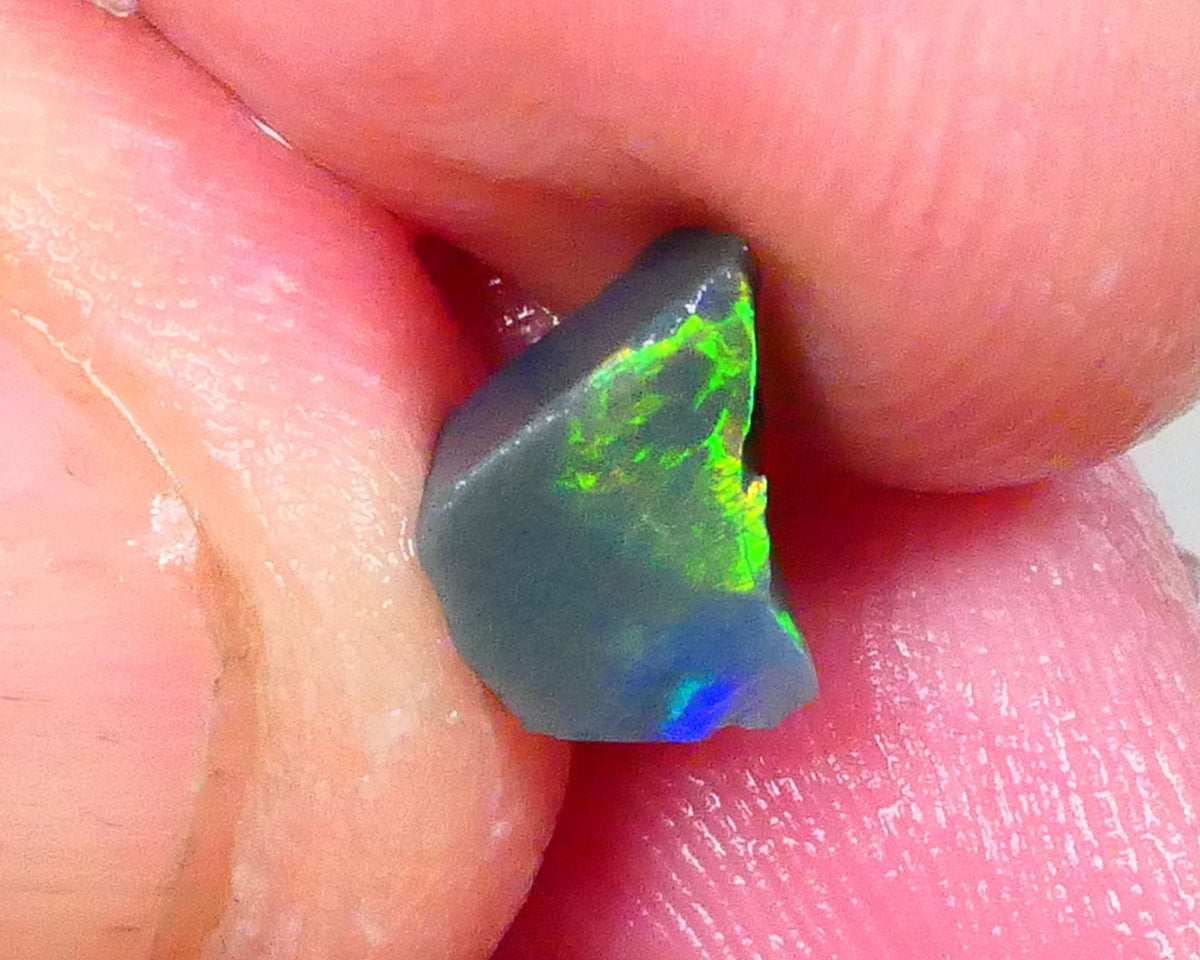 Gorgeous Broad zone of Electric Bright Green fires 1.60cts Lightning Ridge rub/rough pointer to finish 8x6x5mm   Lot B4-A736