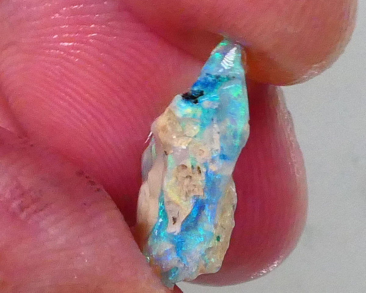 Green Blue hues in Crystal opal in host rock 3.50cts Stunning colours to expose prob suit being carved or gamble cut 15x10x5mm  Lot B4-A761