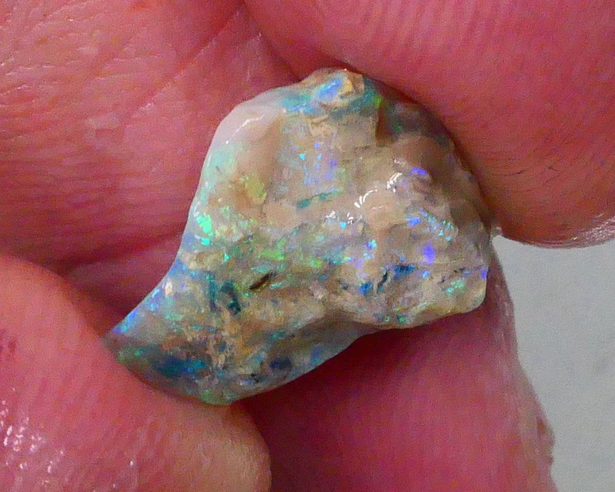 Green Blue hues in Crystal opal in host rock 3.50cts Stunning colours to expose prob suit being carved or gamble cut 15x10x5mm  Lot B4-A761