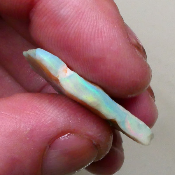 Green & yellows showing in Crystal bar 14.70cts Lighting Ridge Seam opal rough 31x22x4mm Lot B4-A798