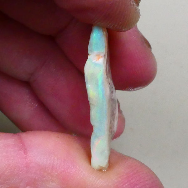 Green & yellows showing in Crystal bar 14.70cts Lighting Ridge Seam opal rough 31x22x4mm Lot B4-A798