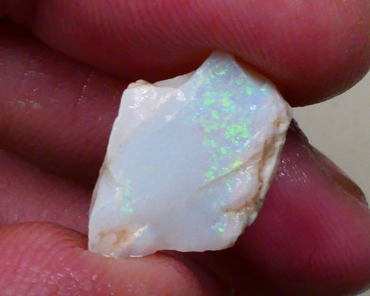 Light base Seam opal rough / rub 7.40cts Green / Blue fires to exposed face 19x12x6mm  Lot B4-A795