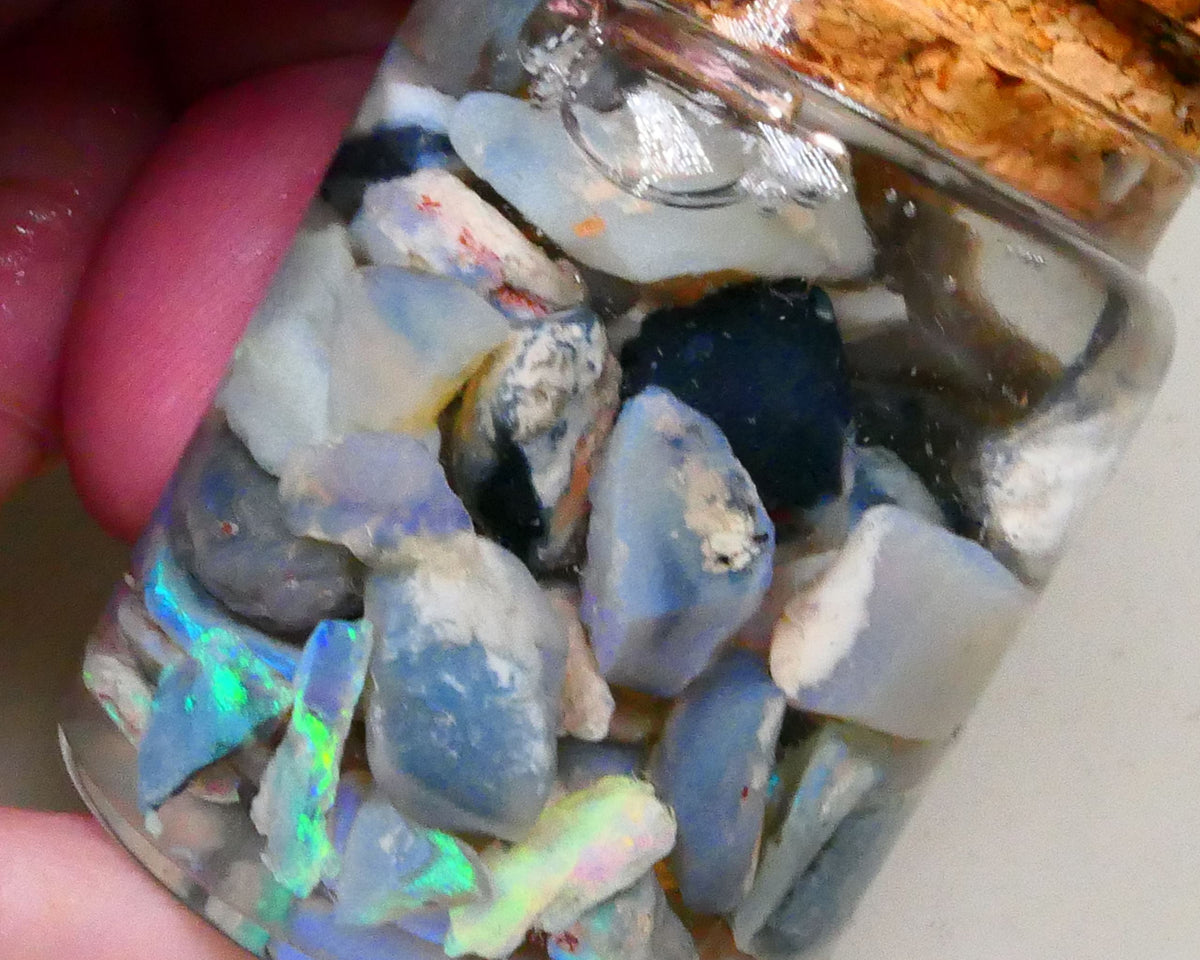 Lighting Ridge Potch & some nice colours 145.00cts Dark base seam & knobby material 15mm to chip size Lot B4-A794