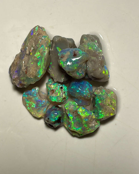 Lightning Ridge 40.75cts &nbsp;20x15x6 to 7x7x6 mm Bid-4.com Bid for Australian opal raw/rough/rubbed/polished £1 No Reserve Auctions Details to come Lot B4-A857