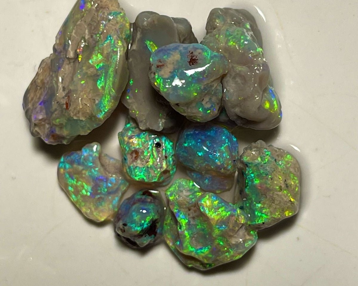 Lightning Ridge 40.75cts &nbsp;20x15x6 to 7x7x6 mm Bid-4.com Bid for Australian opal raw/rough/rubbed/polished £1 No Reserve Auctions Details to come Lot B4-A857