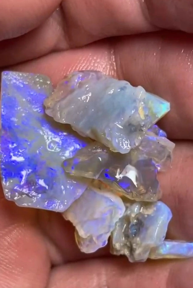 Lightning Ridge Dark Base Crystal opal rough parcel 29.00cts Mostly Blue colours to chase here  20x12x1 to 6x4x1 mm Lot B4-A818