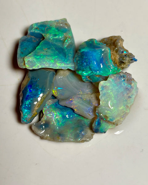 Lightning Ridge Cutters Dark Crystal Seam opal parcel 44.75cts Loaded with Bright Multicolours packed with Potential 20x20x4mm to 20x12x6mm Auctions Details to come Lot B4-A873