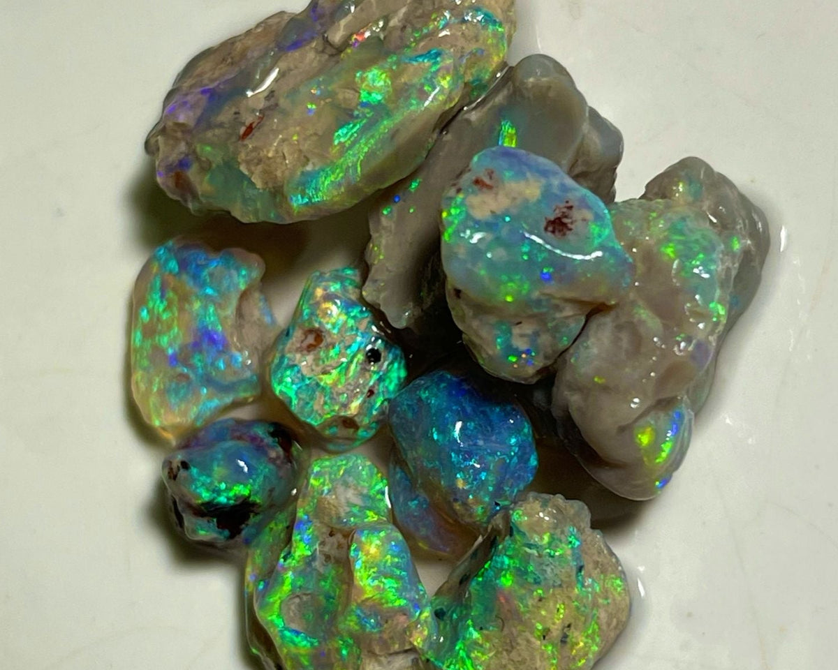 Lightning Ridge 40.75cts &nbsp;20x15x6 to 7x7x6 mm Bid-4.com Bid for Australian opal raw/rough/rubbed/polished £1 No Reserve Auctions Details to come Lot B4-A857